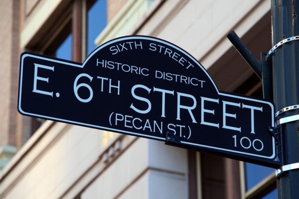 Sixth Street (formerly known as Pecan Street)